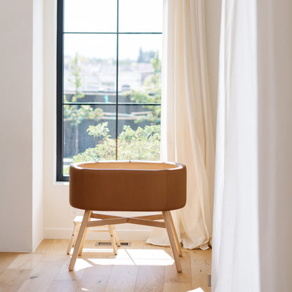 M26834GCLB,babyletto x GATHRE Capsule Bassinet in Camel